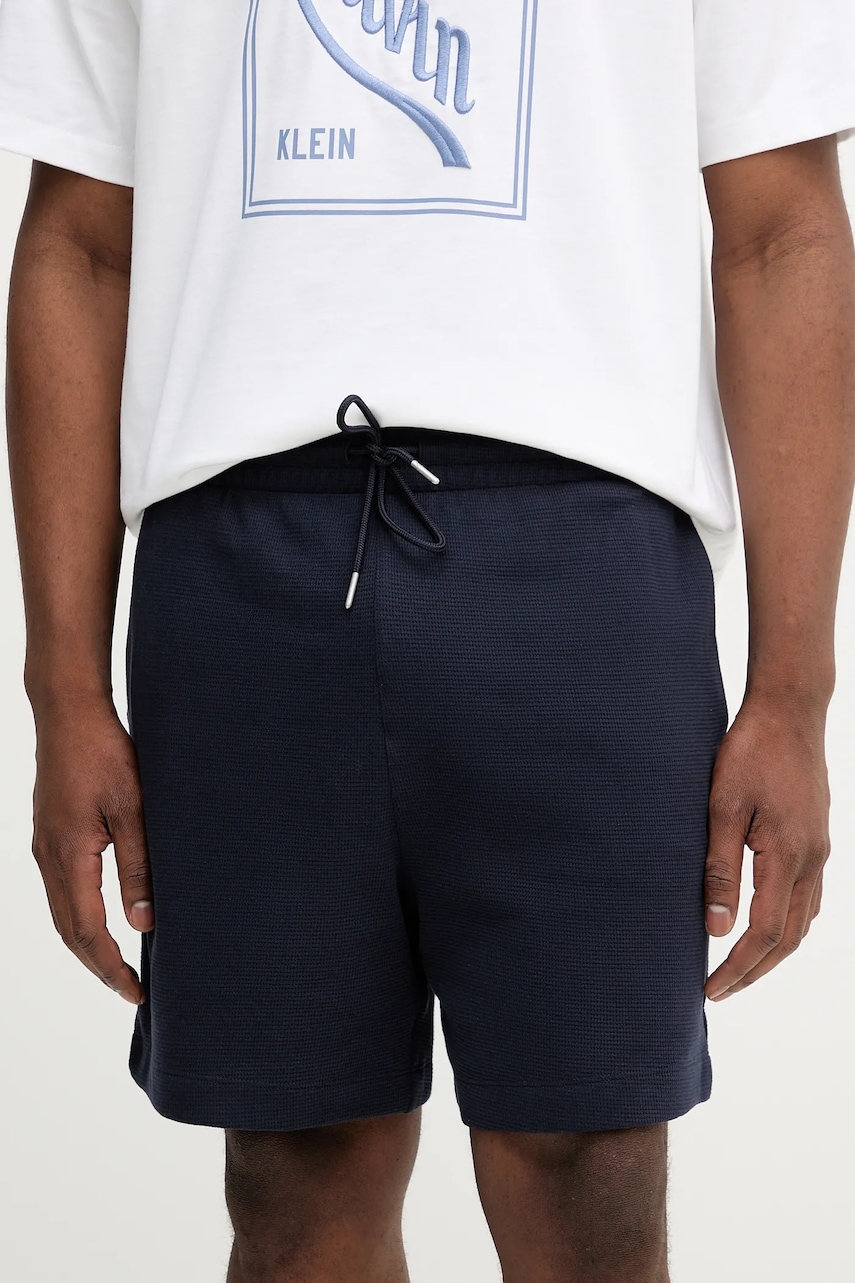 Bavlněné šortky Calvin Klein Jeans pánské, tmavomodrá barva, LV04RC248G