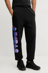 Bavlněné tepláky adidas Performance PRIDE