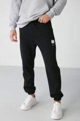 GRIMELANGE Rowan Men's Relaxed Black Sweatpants with Ribbed Front Decorative Label and Lined Interior