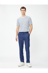 Kotonové látkové kalhoty, slim fit, s knoflíkovými detaily, kapsy.