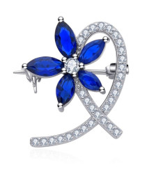MOISS Stříbrná brož Květina s modrými zirkony O0000009