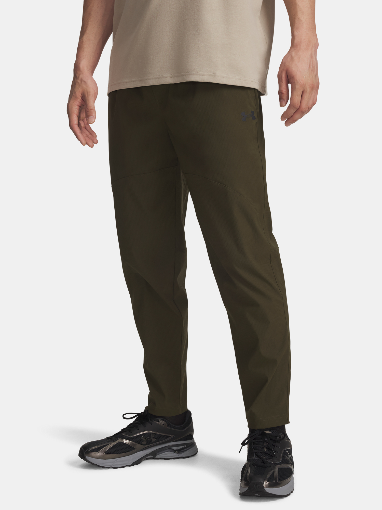 Pánské sportovní kalhoty Under Armour UA UNSTPBLE WOVEN TX TAPER-GRN - Pánské