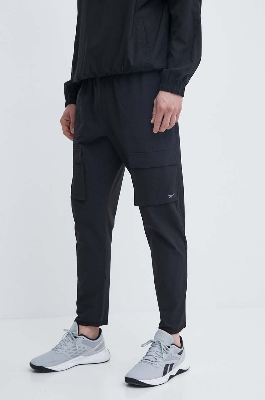 Reebok  Kalhoty  Active Collective