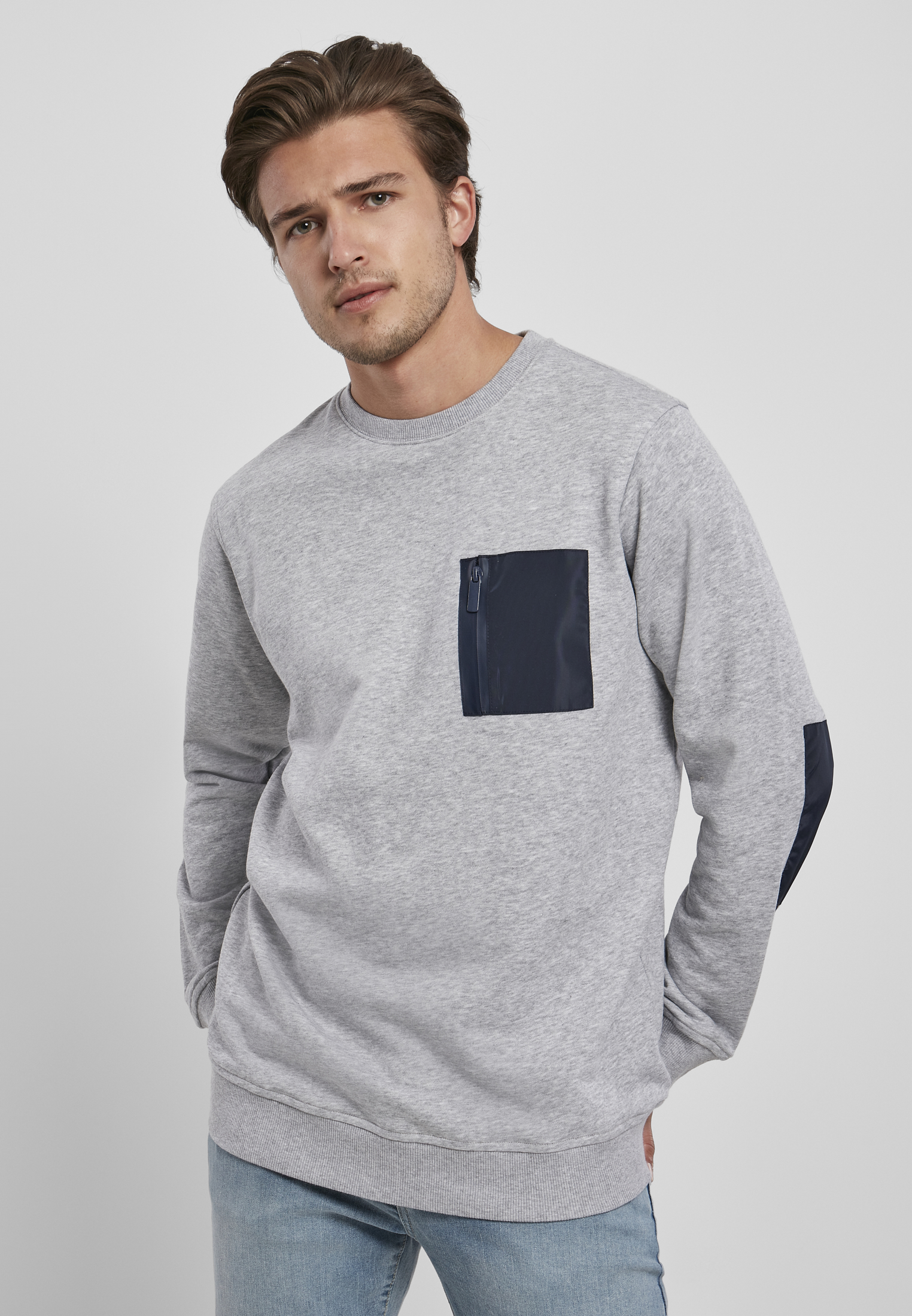 Sportovní svetr s kapsou